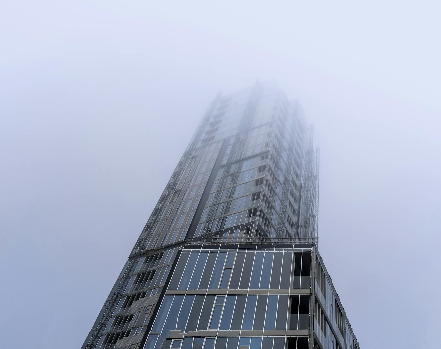 panorama vinterbillede af taarn paa amager under opbygning Byggnad under uppförande vintertid, med dimma och dis runt motivet